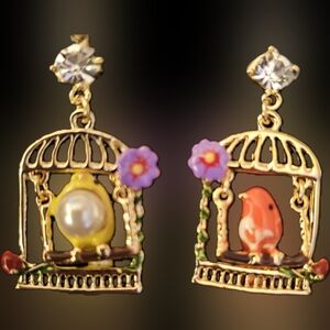 Bird swinging in birdcage earring